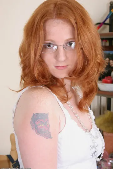 Woman Undresses Fully and Stands Naked