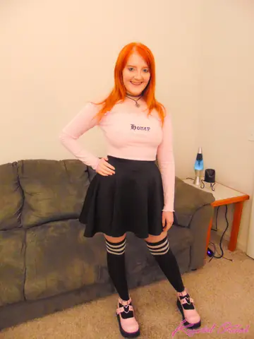 Krystal Orchid – Redhead with Natural Tits Lifts Her Skirt and Shows Her Shaved Pussy