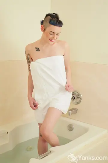 Tall Woman Pleasures Her Hairy Pussy with a Dildo After a Bath