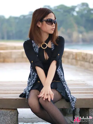 Japanese Redhead Strips Naked on the Beach in Heels and Glasses