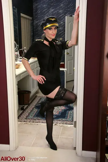 Genevieve Sweets – Mature Brunette MILF Strips Out of Her Uniform and Stockings in Heels