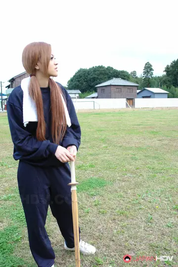 An Umemiya – Japanese MILF in Pigtails Gives a Blowjob Outdoors