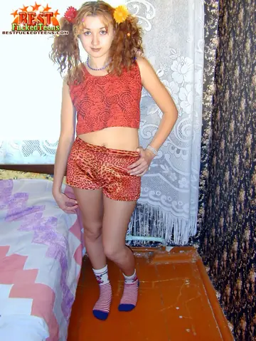 European Redhead Spreads Her Hairy Pussy on the Bed