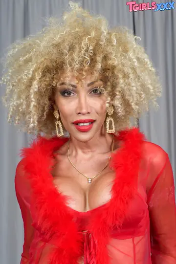 Ebony Trans Woman Strips Nude and Flaunts Her Curves and Cock