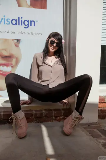 Thick Brunette with Big Natural Tits Teases in Public Wearing Glasses