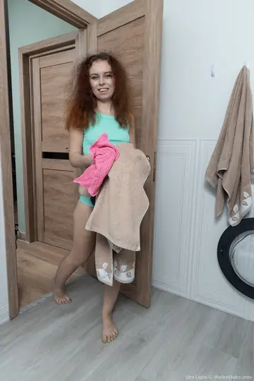 Lira Light – Petite Redhead Shows Her Hairy Pussy and Big Ass in the Bathroom