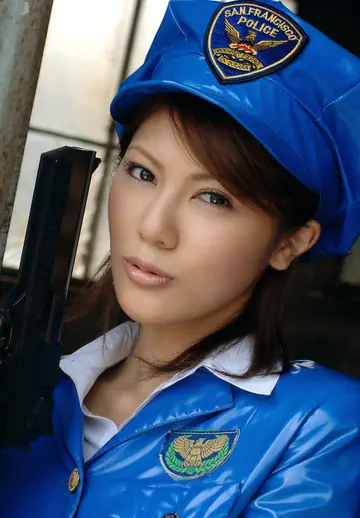 Asian Policewoman Poses in Latex Uniform and Bikini