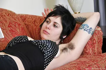 Thick MILF Bares Her Hairy Armpits and Fingers Her Bush Wide Open