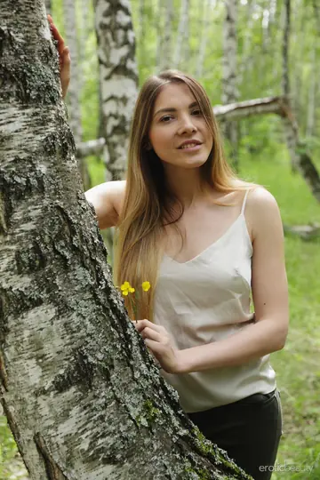 Busty Woman Strips in the Woods and Spreads Her Pussy