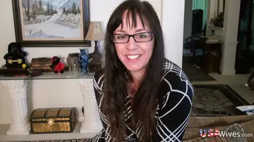 Busty MILF in a Skirt and Glasses Uses a Dildo and Takes Anal