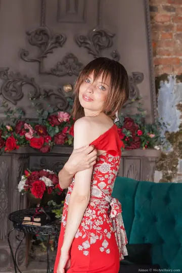 Short-Haired Slim Woman Bares Hairy Armpits and Bush Nude
