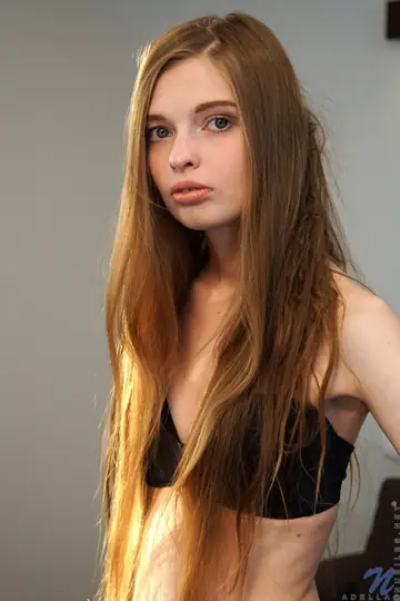 Tall Redhead Strips Out of Her Lingerie and Fingers Her Pussy