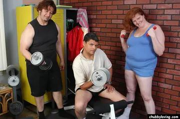 Mature Curvy Redhead Takes Two Cocks in Public