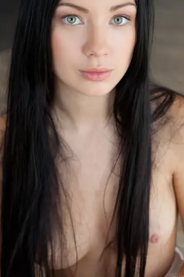 Skinny Woman Spreads Her Shaved Pussy Wide for the Camera