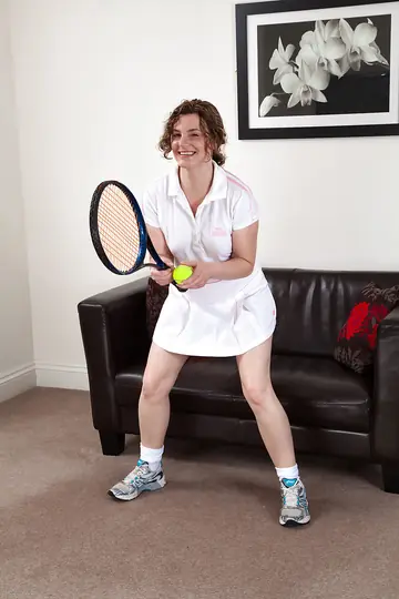 Sofia Matthews – Curly MILF Lifts Her Tennis Skirt to Flash Her Hairy Bush