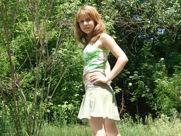 European Woman Strips Nude Outdoors to Show Her Hairy Pussy