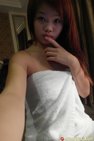 Slim Asian Redhead Takes Anal Doggy Style