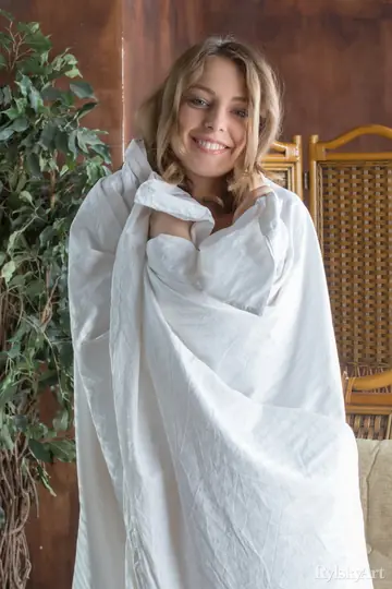 Blonde Woman Poses Nude and Shows Her Tight Ass
