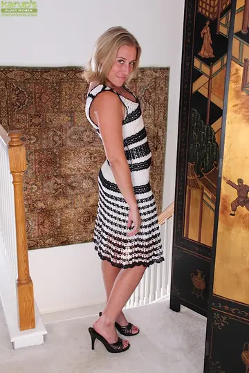 Thick Blonde MILF Slips Off Her Panties and Fingers Her Pussy