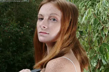 Allison Wyte – Thick Redhead with Big Tits and Tattoo Spreads Outdoors