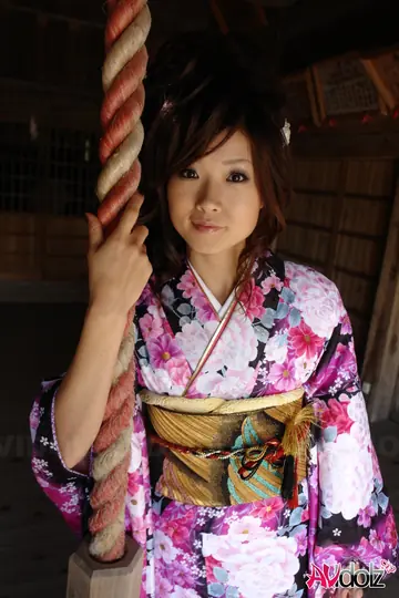 Japanese Brunette Poses in Socks and Traditional Wear