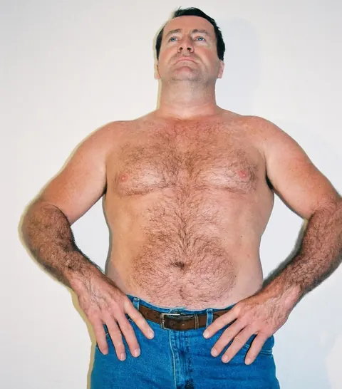 Mature Hairy Man Strips Nude and Poses – photo 7 of 20