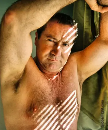 Mature Hairy Man Strips Nude and Poses