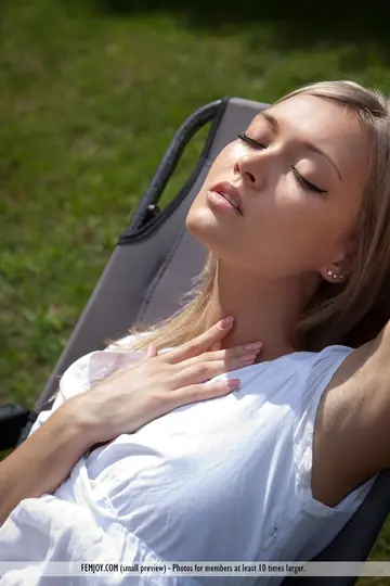 Blonde Woman Spreads Her Legs in the Backyard