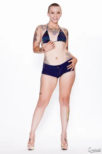 Sparky Sin Clair – Brunette with Small Natural Tits and Tattoos Poses Nude for the Camera
