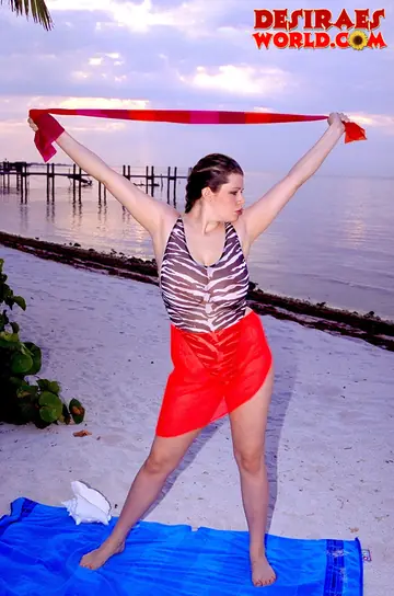 Desirae – Busty Brunette MILF Bares All and Spreads Her Legs on the Beach