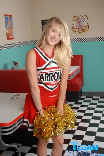 Tegan Summers – Blonde Models Her Uniform Skirt in a Non-Nude Set