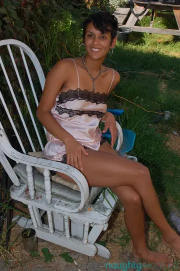 Ebony Woman with Short Hair Shows Hairy Armpits and Bush Outdoors