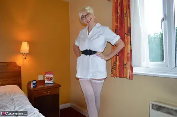 Curvy British MILF in Stockings Takes a Facial in a Threesome