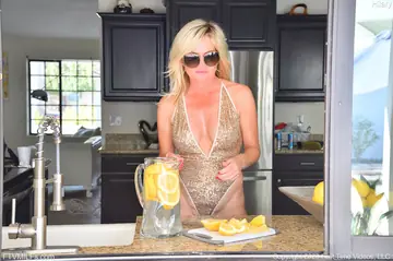 Busty Blonde MILF Masturbates with a Cucumber by the Pool
