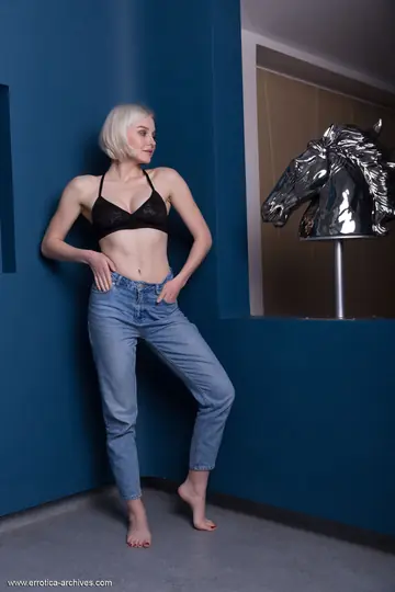 Blonde with Big Tits Sheds Her Bra and Jeans to Pose Nude
