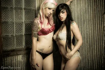 Lynn Pops – Blonde and Brunette MILFs Pull Panties Aside and Kiss in Lingerie
