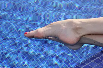 Blue Angel – Tall European Blonde and Slim Brunette Spread Their Feet in Heels by the Pool