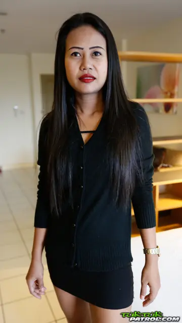 Slim Mature Thai Woman Strips Off Her Black Dress to Show Her Shaved Pussy