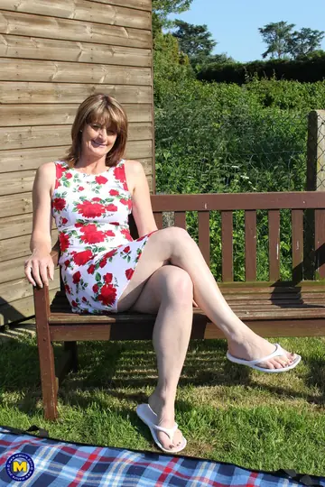 European Redhead MILF Strips Out of Her Dress Outdoors