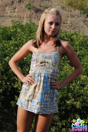 Skinny Blonde Strips Off Her Skirt and Poses Nude Outdoors