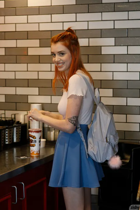 Wanda Ablee: Redhead in a Skirt Pulls Panties Aside Outdoors – photo 2 of 12
