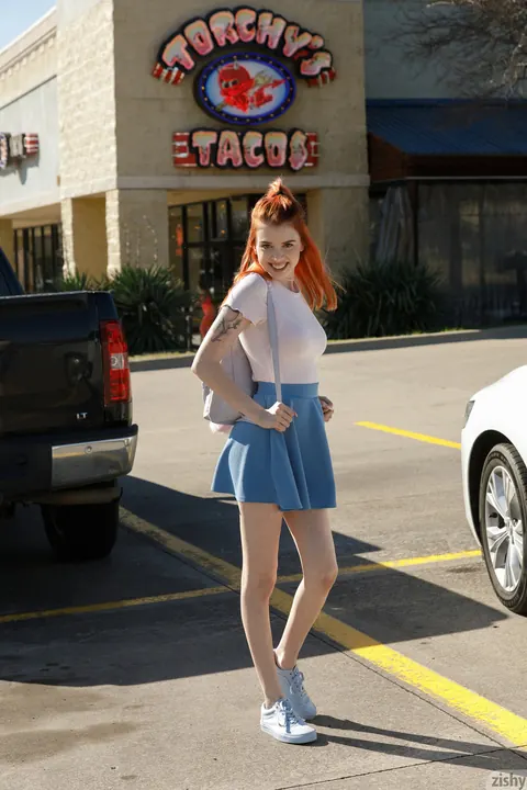 Wanda Ablee: Redhead in a Skirt Pulls Panties Aside Outdoors – photo 1 of 12