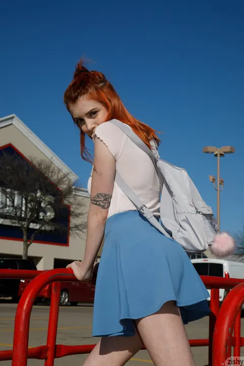 Wanda Ablee: Redhead in a Skirt Pulls Panties Aside Outdoors – photo 6 of 12