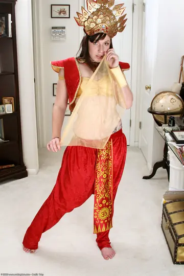 Loni – Asian MILF Undresses and Poses Nude for the Archives