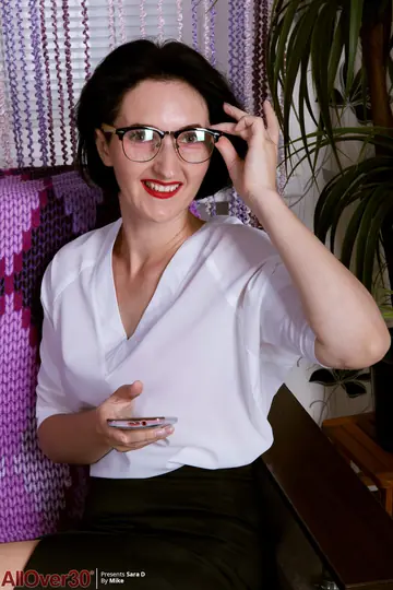 Curvy MILF in Lingerie and Glasses Strips to Show Her Hairy Pussy