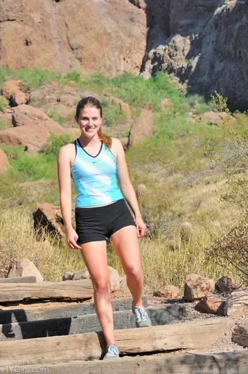 Woman Strips Out of Her Dress and Shorts to Ride a Dildo on the Gym Mat