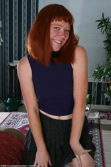 Pale Redhead Spreads Her Hairy Pussy Outdoors