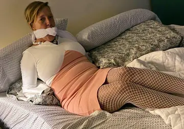 Mature Woman in Stockings and Heels Gets Bound and Restrained
