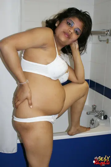 Indian Woman Strips Naked and Showers in the Bathroom