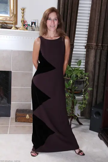 Mature Redhead MILF Strips Out of Her Dress and Spreads Her Shaved Pussy